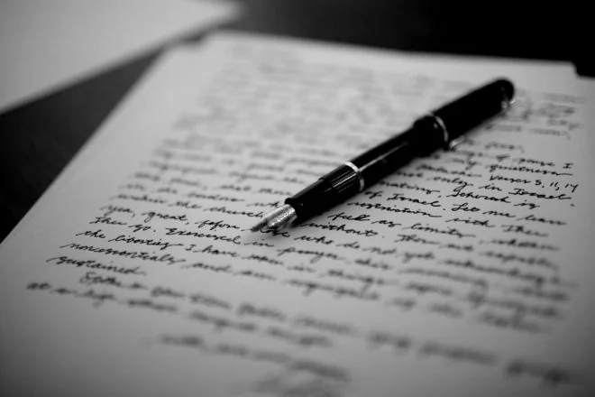 Pen writing on a legal document